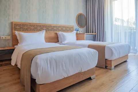 A double bed and a single bed in the family room